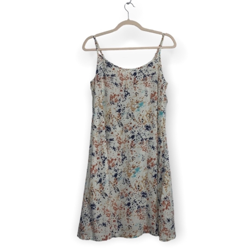 Slip on spaghetti strap cami cream colored dress with adjustable straps